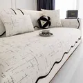 Funda de sofá beige moderna con líneas grises y diseño de borde ondulado negro - 70cmx70cm / Caqui