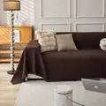 Dark brown waffle weave couch cover with decorative fringe tassels on a modern sofa - Custom 180 Wide Sofa Towel Per Meter / Dark Coffee
