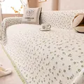 Off-white chenille sofa cover featuring small green floral patterns and beige fringe - Green / 180*130