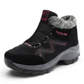 Women's black winter snow boots with pink accents and warm faux fur lining - Black
