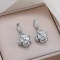 Silver four-leaf clover earrings with sparkling zircon pave and white cat eye stones - E2012 - Steel Color Earrings - 2