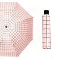 Pink grid pattern folding umbrella with black vinyl coating for UV protection and sun use - Manual Pink Grid