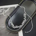 Silver multi-layer snake bone chain necklace with metallic leaf pendants and adjustable beads - X711