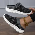 Close-up of breathable black knit mule sneakers with chunky white cushioning soles - 35 / Black