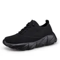 Classic all-black running sneakers with breathable knit upper and thick wave-textured soles - EU 35 / All Black