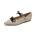 Elegant beige polka dot pointed toe Mary Jane flats with black bows and buckle strap - EU 35 / Apricot