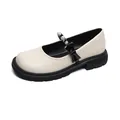 Beige platform Mary Jane shoes with black rubber soles and decorative pearl bow accents - EU 34 / Black