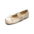 Elegant champagne silk ballet flats with bow and dual grommet straps for women - EU 35 / Champagne
