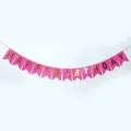 Close-up of pink swallowtail banner with gold foil Happy Birthday lettering detail - Rose Red Gold Happy Birthday