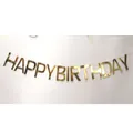 Golden mirror finish HAPPY BIRTHDAY banner hanging on a white wall for party decor - Gold Solid