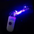 Macro detail of 1m LED fairy lights with button battery box and bright purple glow - Purple Character / Purple