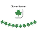 Macro view of St. Patrick's Day clover banner showing dimensions of 11x12cm glitter pieces - Dark Green Shamrock Garland (Glitter)
