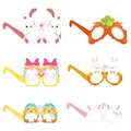 Detail view of six cartoon Easter paper glasses featuring bunnies, eggs and chicks - Series Three (Style C)