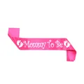 Detail of pink satin Mommy To Be sash with white lettering and baby footprints - Rose Red Mommy To Be