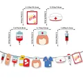 Nurse graduation party banner with Happy Grad signs and medical theme decorations - Nurse Happy Grad Garland