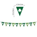 St. Patrick's Day shamrock banner with green felt pennants and white clover patterns - Irish Festival Pennant Banner