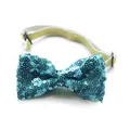 Detail view of sky blue sequin bow tie for pets with adjustable golden elastic strap - Blue Bowtie