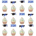 Close-up of 2026 graduation glitter cake toppers with cap and diploma on cupcakes - 2026 Scroll Graduation Cap Style / Blue