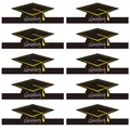 Close-up of 10-piece black congrats graduation cap paper cake toppers with yellow tassels - Tassel Style (Black)