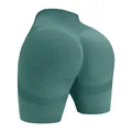 High-waisted seamless peach lift fitness shorts in dark teal green with hollow details - M / Bottoms / Green
