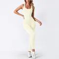 Creamy white ribbed seamless yoga jumpsuit featuring a sleeveless bodycon fit design - Off-White 3304 (With Padded Cups)