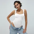 Slim fit white ribbed yoga bodysuit with square neck and wide straps for active training - S / White