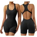 Seamless black biker short bodysuit with open back cutout for yoga and fitness - S / Jumpsuits / Black