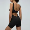 Zwarte rugloze yoga bodysuit van elastische stof voor fitness en trainingen - S / Zwart