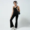 Tuta da yoga nera slim fit con schiena scoperta, reggiseno integrato e gamba svasata - Taglia S / Nero 4356 (con imbottiture)
