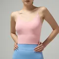 Light pink yoga sports bra with thin straps and a ribbed band for enhanced support - Long Waist Pink