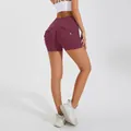 High waist scrunch butt yoga shorts in burgundy featuring cargo pockets with button details - S / Bottoms / Short / Burgundy