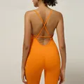 Bright orange seamless backless yoga jumpsuit with criss-cross straps and ribbed texture - S / Top And Bottom / Orange
