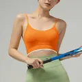 Orange sports bra with thin straps and light green high-waist yoga leggings set - Color Block Orange