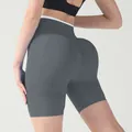 Dark gray high-waisted yoga shorts with push-up effect and seamless slimming design - XS / Bottoms / Dark Gray