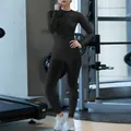 Women's black thermal ski base layer set with moisture-wicking compression fabric - S / Top And Bottom / Black