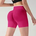 High-waisted seamless yoga shorts in rose red with scrunch butt lifting design - S / Bottoms / Rose Red