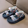 Detail view of boys' camouflage sport sandals with adjustable metal buckles and thick soles - Size 21 (14cm) / Orange