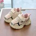 Detail of pink mesh children sneakers with velcro strap and anti-slip thick sole - EU 22 / Pink