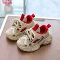 Detail of kids breathable mesh sneakers with red accents and non-slip thick rubber sole - EU 21 / Red