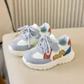 Detail showing colorful panels and velcro strap on children's retro sneakers - Size 21 (13.5cm) / Gray