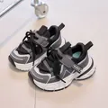 Detail view of children's breathable mesh sneakers with chunky anti-slip sole and Velcro strap - EU 21 / Black