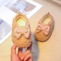 Plüschige Baby-Lauflernschuhe in Camel mit gepunkteter Schleife und Warmfutter - EU 27 / Cremeweiß