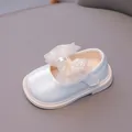 White baby Mary Jane shoe with mesh texture and large pearl butterfly bow detail - Size 16 (Inner Length 12cm) / White