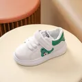 Toddler white sneakers featuring a green fuzzy bear patch and easy velcro strap closure - EU 21 / Green