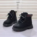 Detail view of black kids boots showing lacing, gold eyelets and side zipper - Thin Fleece / Size 21 Inner 13.5cm / Black