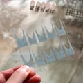 Blue and white snowflake pattern nail stickers with heart motifs for French manicure style - Blue White Snowflake Heart Plaid (TZ-004)