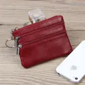 Portefeuille en cuir rouge foncé à motif litchi avec triple zip et porte-clés - Bordeaux
