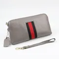Grey pebbled leather wallet featuring a red and black striped webbing detail and wrist strap - Light Gray