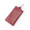 Schlüsseltasche aus Leder in Weinrot mit Lychee-Narbung und drehbarem Metallclip - Burgunderrot