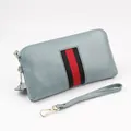 Light blue pebble leather long wallet with red and black stripe and gold zipper - Light Blue